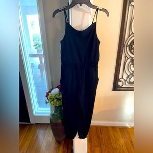 One piece romper. Sleeveless, great paired with a jean jacket.